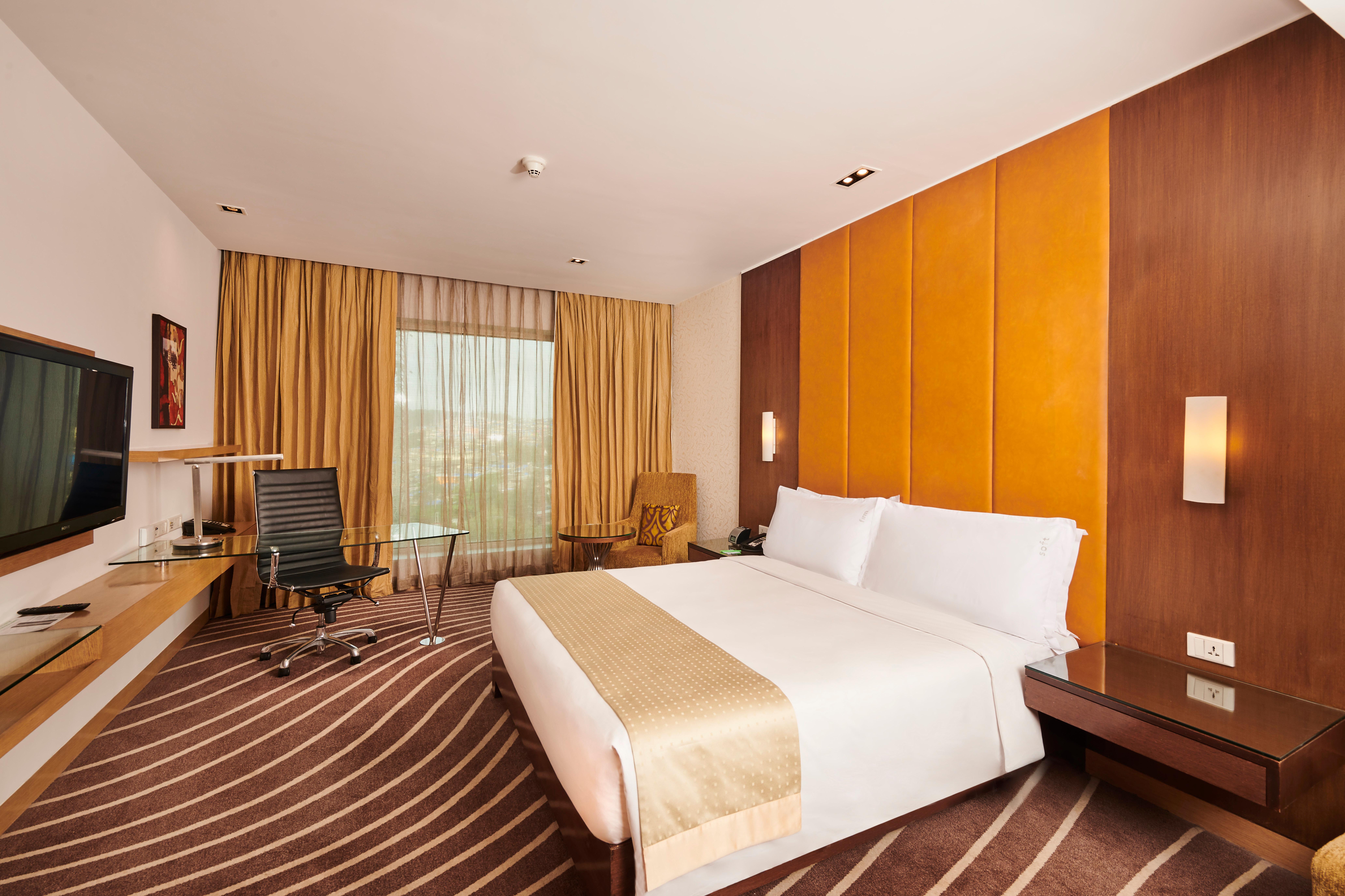 ฮอลิเดย์ อินน์ สนามบินนานาชาติมุมไบ ภายนอก รูปภาพ A room at the hotel